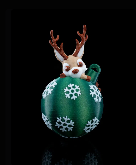 Boule verte avec flocon et renne