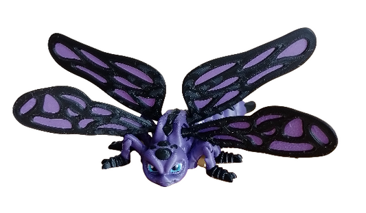 Libellule articulée violette et noire