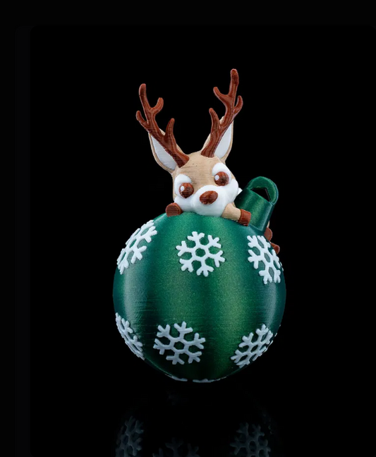 Boule verte avec flocon et renne